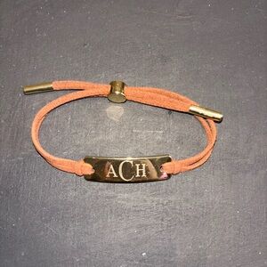 Gold and Tan Bracelet with ACH Engraving